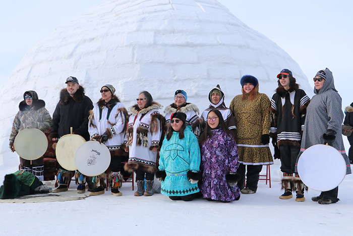 Caption: The Huqqullaaqatigiit drum dancers from Cambridge Bay. Photo by Tristan Omik.